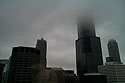 This is an old one!  In April 1999 I was working in Chicago for a week.  I snapped this morning fog over downtown Chicago with a Kodak DC210+, my first usable digital camera.