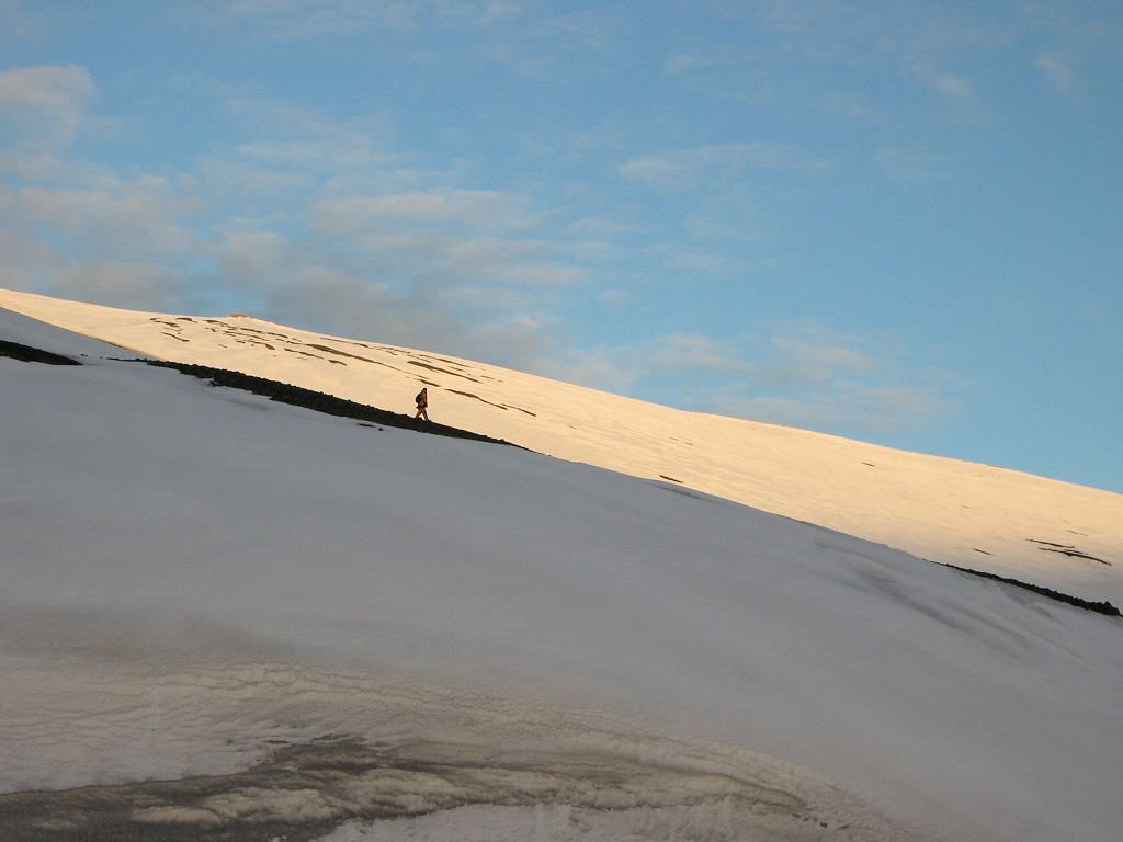 One of the guides descends after a hike inside the volcanic caldera that is Deception Island.  Click for next photo.