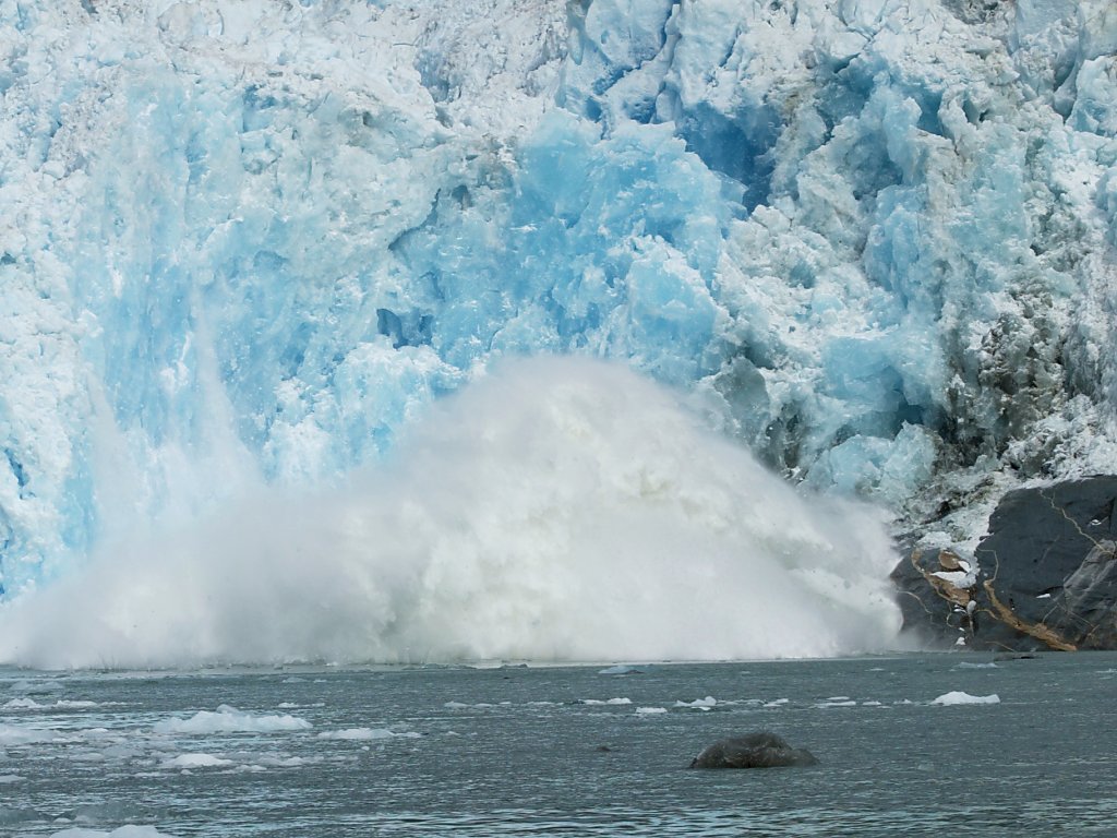 Chunks fall off LeConte Glacier into the water.  Click for next photo.