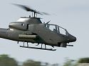 A Cobra helicopter demonstrates Vietnam battle tactics.