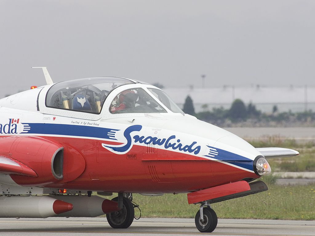 Canadian Snowbirds get ready to take off.  Click for next photo.