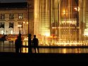 A group watches the fountain in front of Union Station, Kansas City, while waiting for a photographer (not me) to set up a shot.