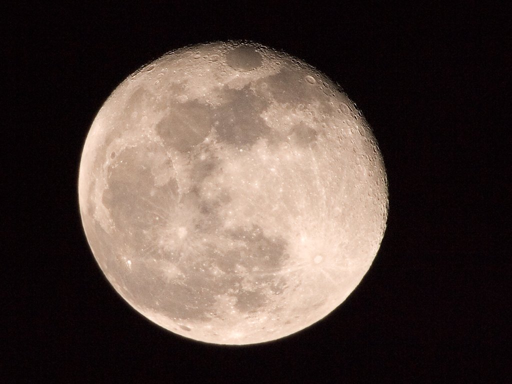 Moon one day past full with 500mm lens and 1.4x extender on DSLR.  Click for next photo.