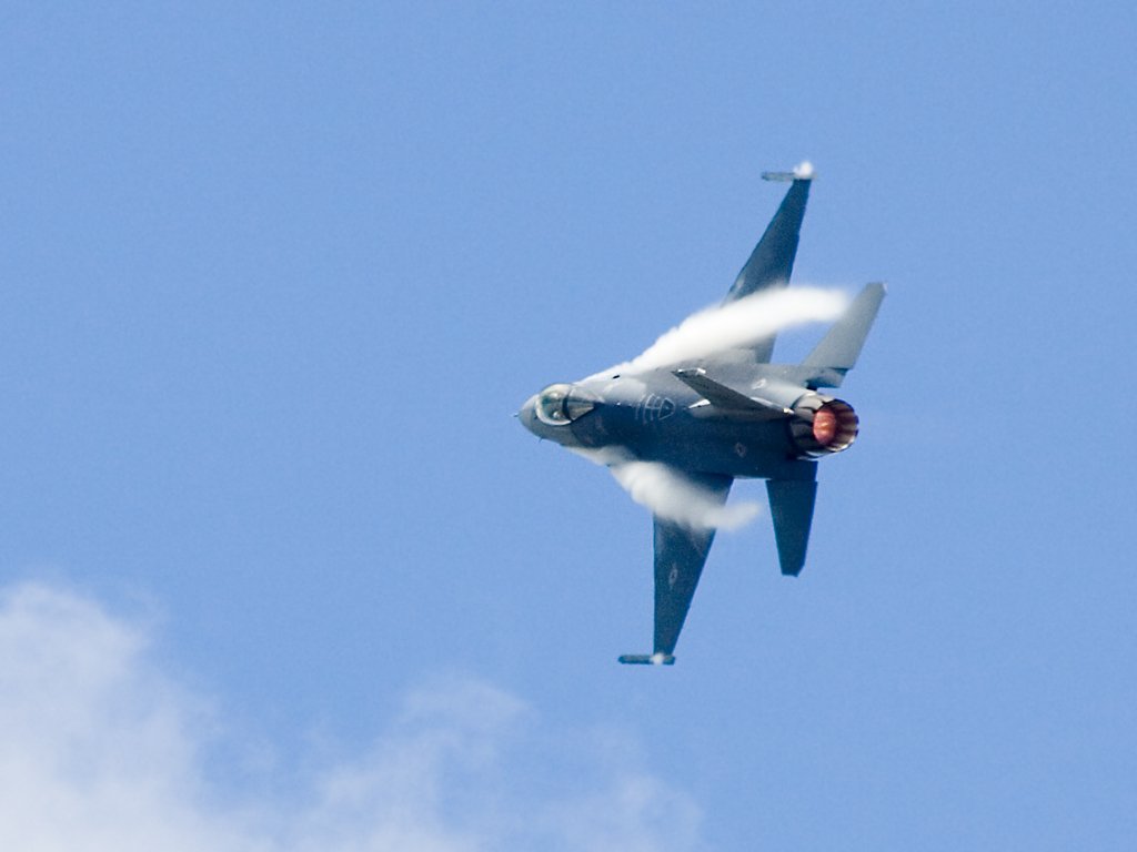 F-16 Falcon smashing moisture out of the air, TICO Warbirds Air Show, Titusville, Florida, March 2008.  Click for next photo.
