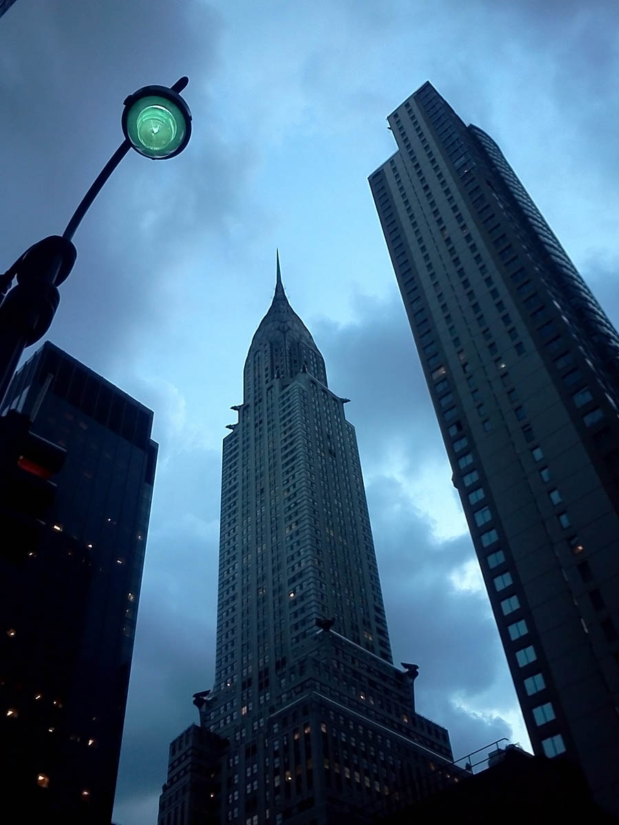 Chrysler Building at dusk.  Maybe the only camera phone photo Ive posted on my site, but (for me) it captures a mood.  And the street light hanging over the scene sort of brought to mind a Martian walker from "War of the Worlds."  Click for next photo.