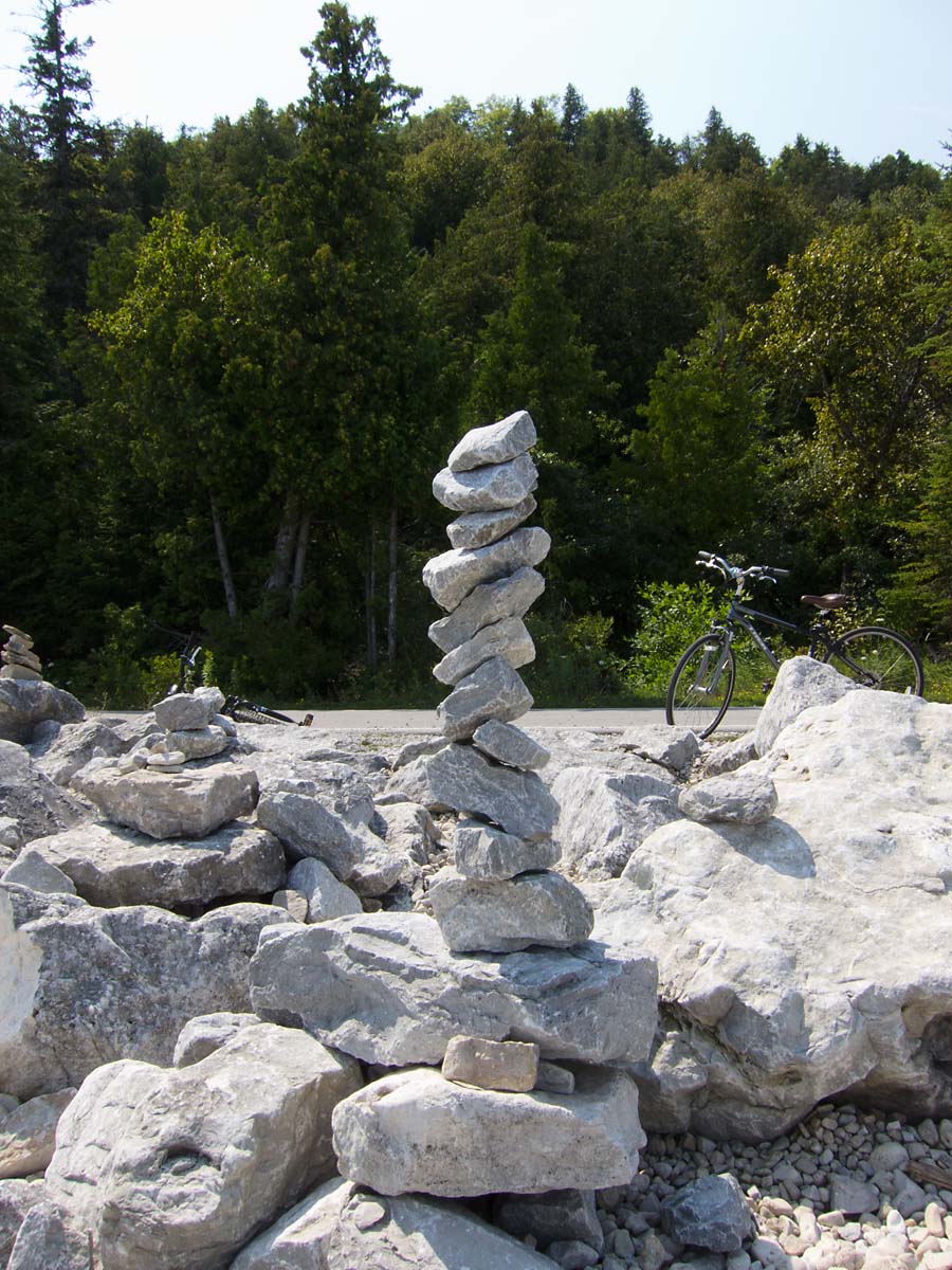 Rock stacking along the bike trail, Mackinac Island, Michigan, August 2013.  Click for next photo.
