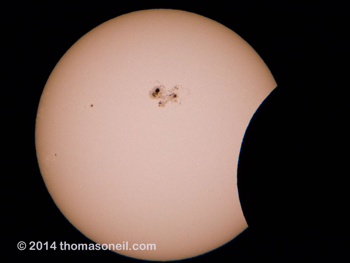 The start of a partial solar eclipse, October 23, 2014.  Click for next photo.