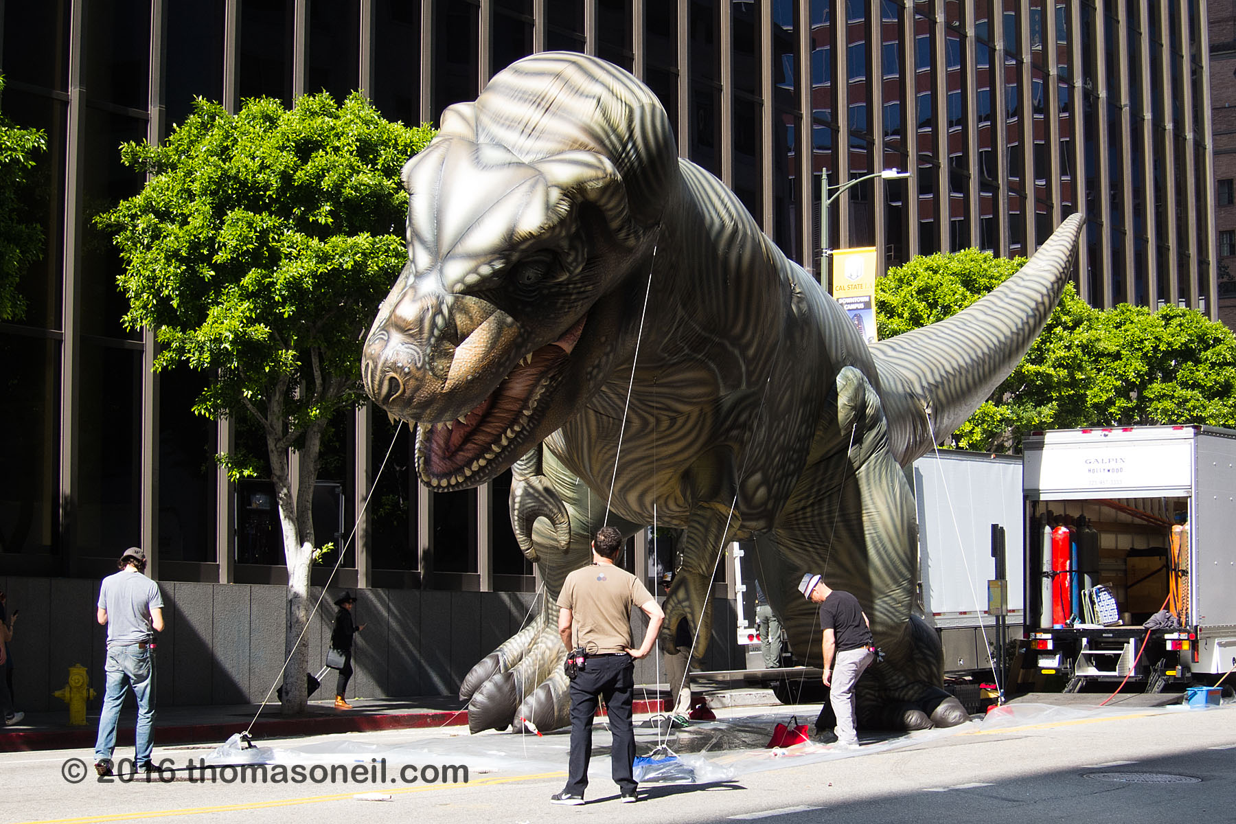 Random street scene in downtown Los Angeles.  I have no idea why these guys were carrying around a giant dino balloon.  Click for next photo.