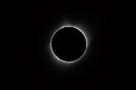 Solar eclipse, Aug. 21, 2017, very fast shutter speed (1/2500) reveals prominences rising from surface of the sun at 12:00, 1:00 and 3:00.