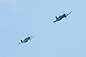 P-51 Mustang Red Tail chases F-4U Corsair, Sioux Falls Air Show.