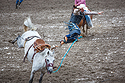 Saddle bronc at Home of Champions Rodeo, Red Lodge, MT, July 4, 2021.