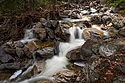 Snow Creek in the national forest,.  Polarizer filter, exposure 1/2 second.