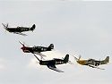 The Breitling Fighters (Spitfire, P-40 Flying Tiger, Corsair, and P-51D Mustang).
