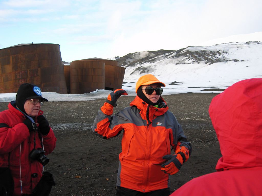Naturalist Dorinda Dallmeyer explains the history of the whaling station on Deception Island.  Click for next photo.