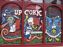 Cork pub painted its windows in support of the local hurling club playing in the All-Ireland championship that weekend, Ireland.
