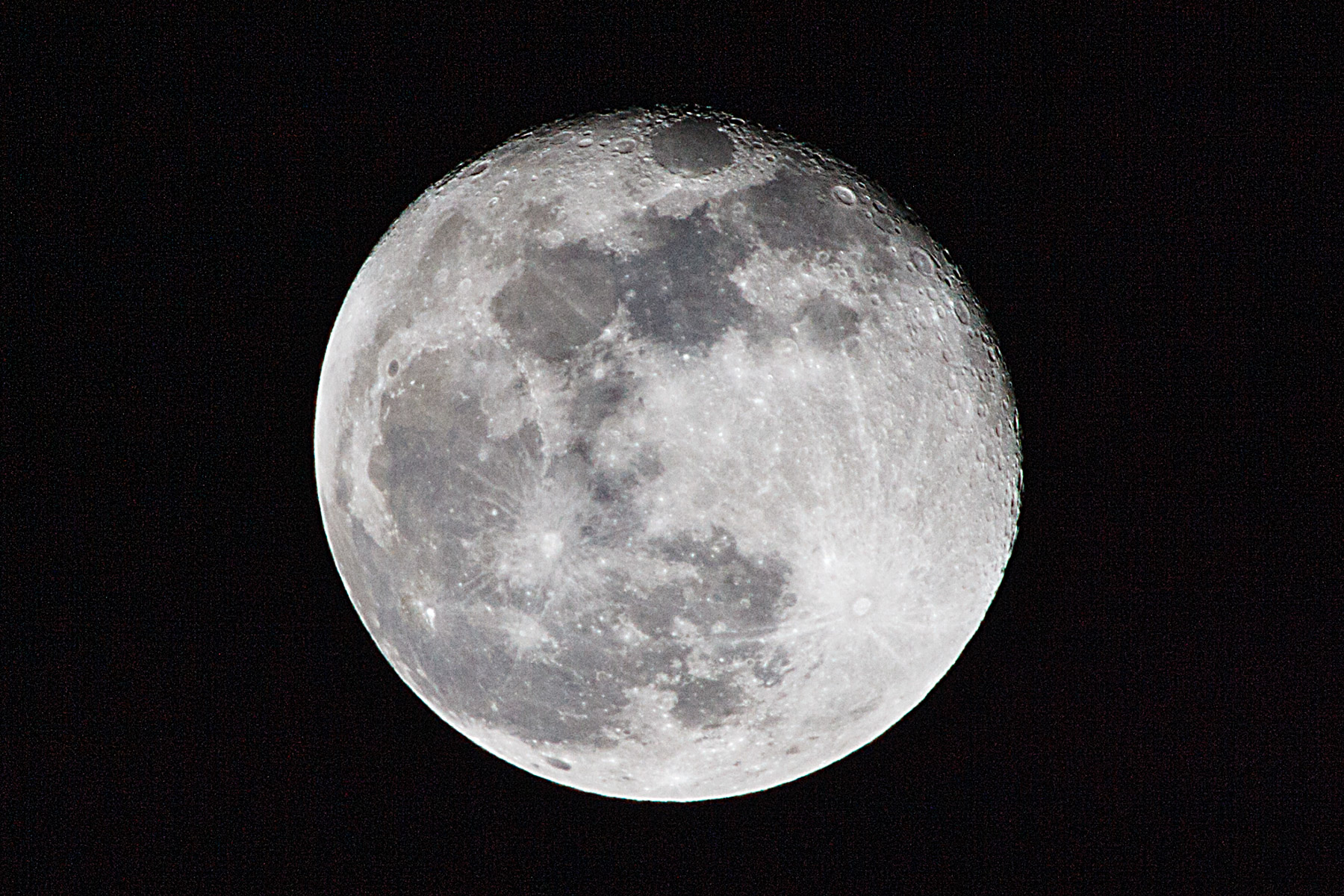 Moon one day past full with 500mm lens and 1.4x extender on DSLR.  Click for next photo.