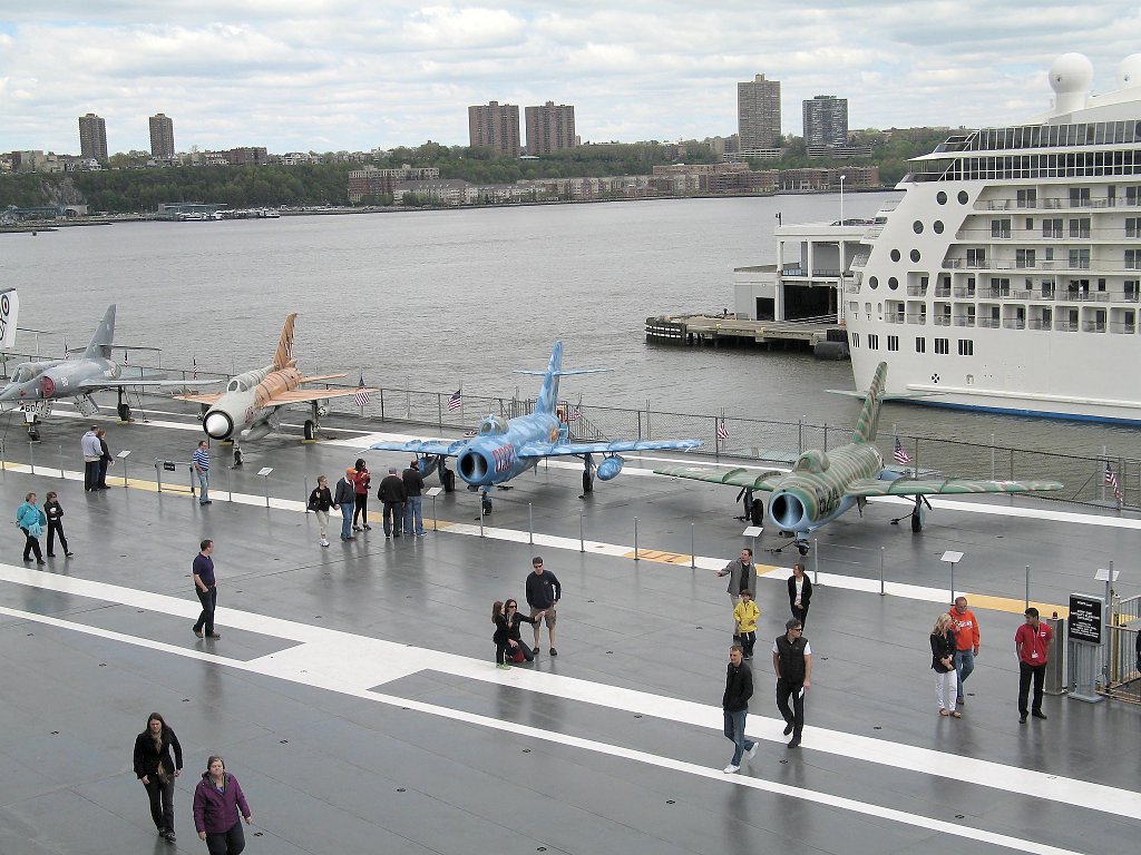 MiGs lined up on USS Intrepid, New York City.  Click for next photo.