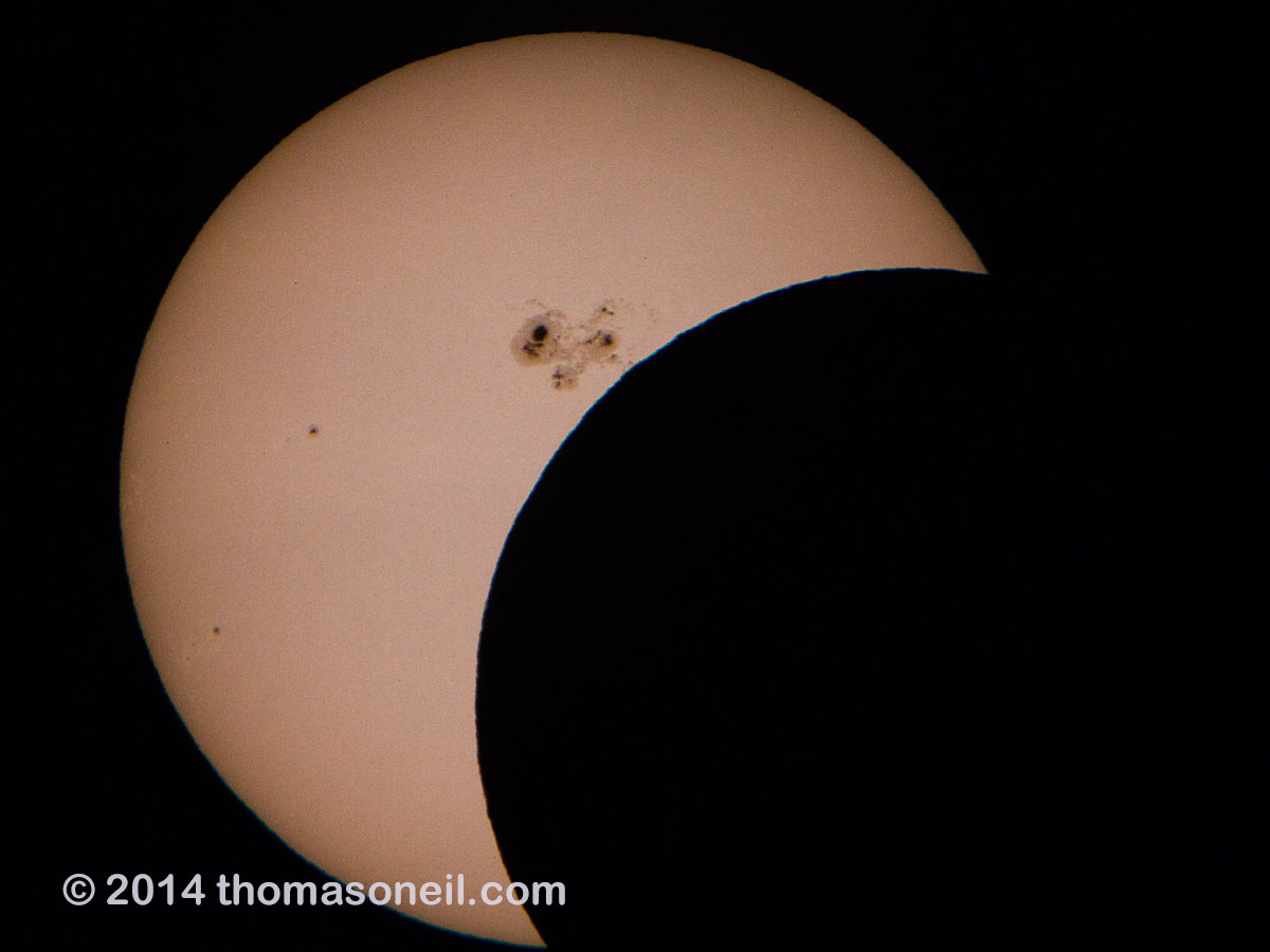 Partial solar eclipse.  Last good shot I got before the clouds got in the way.  Click for next photo.