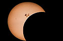 Partial solar eclipse.  Last good shot I got before the clouds got in the way.
