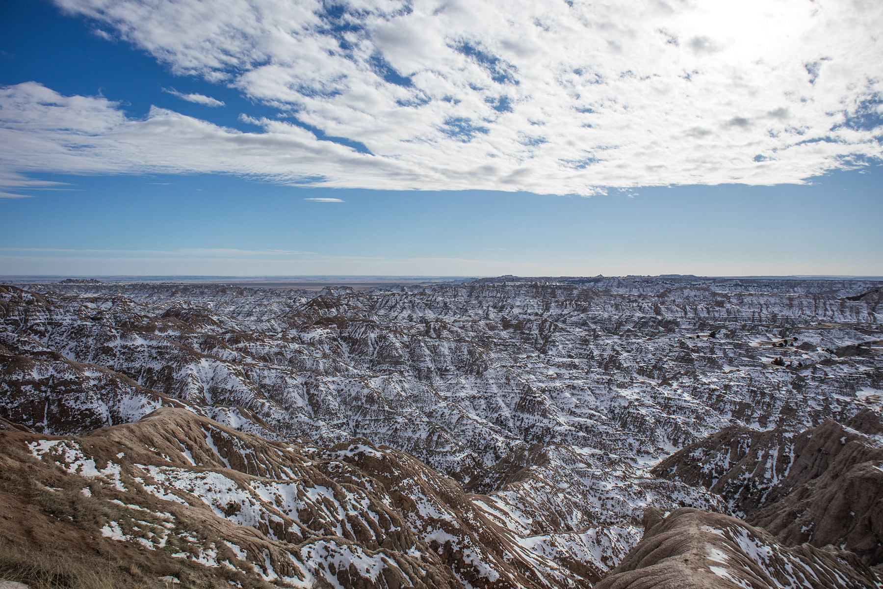 Badlands National Park touched by snow.  Click for next photo.