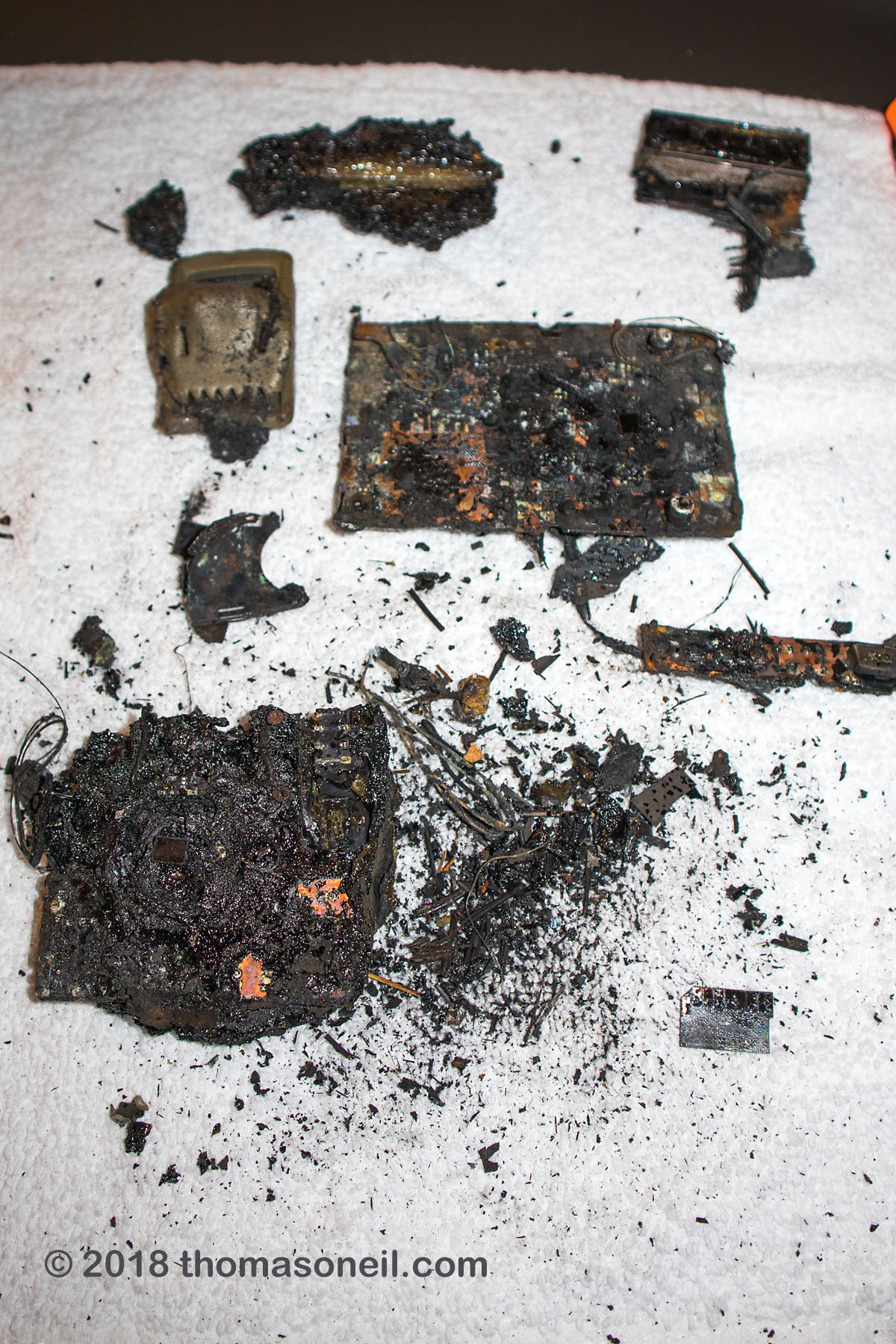 The remains of my Moultrie trail camera, destroyed by fire in December 2017 in Custer State Park  Click for next photo.