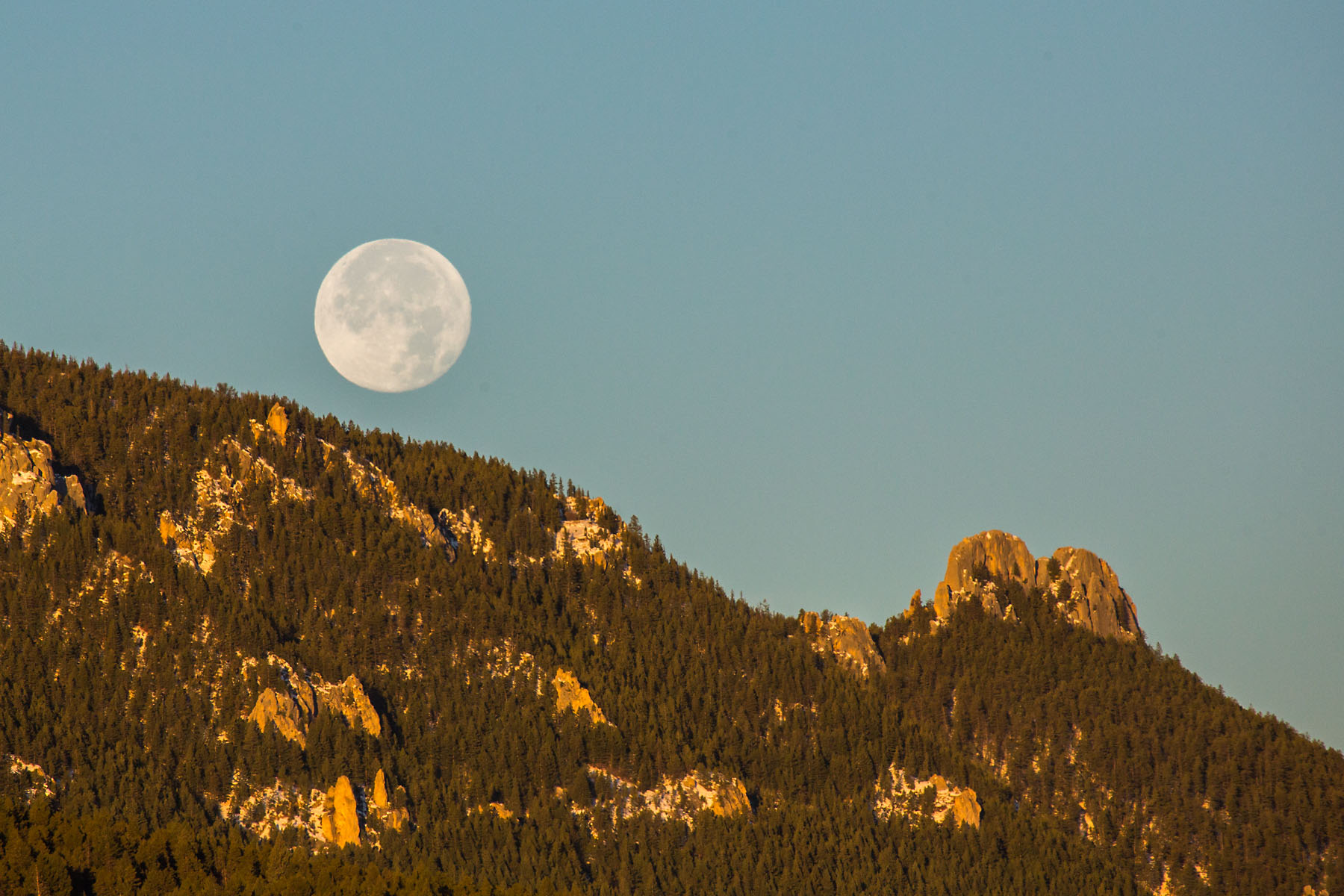 Full Moon setting over Red Lodge Mountain.  Click for next photo.