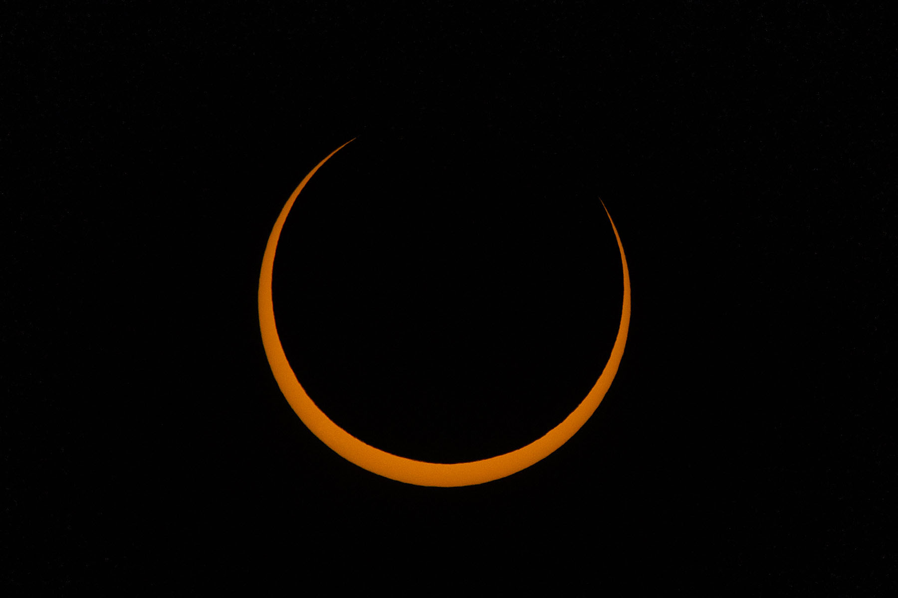 Annular solar eclipse, three minutes before peak, film solar filter on 100-400mm camera lens, 1.4x extender, Canon R10 camera.  Click for next photo.