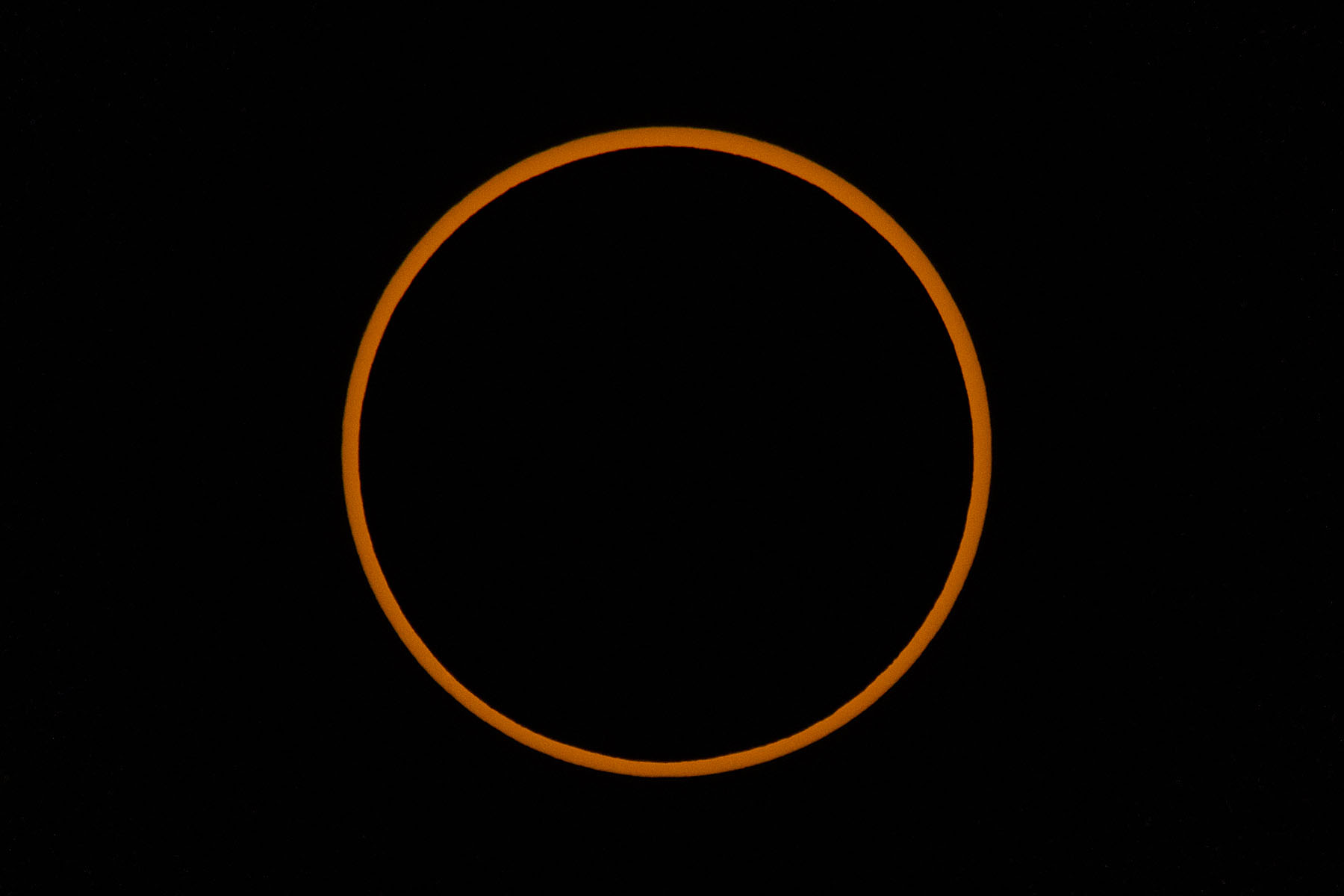 Annular solar eclipse, at peak, film solar filter on 100-400mm camera lens, 1.4x extender, Canon R10 camera.  Click for next photo.