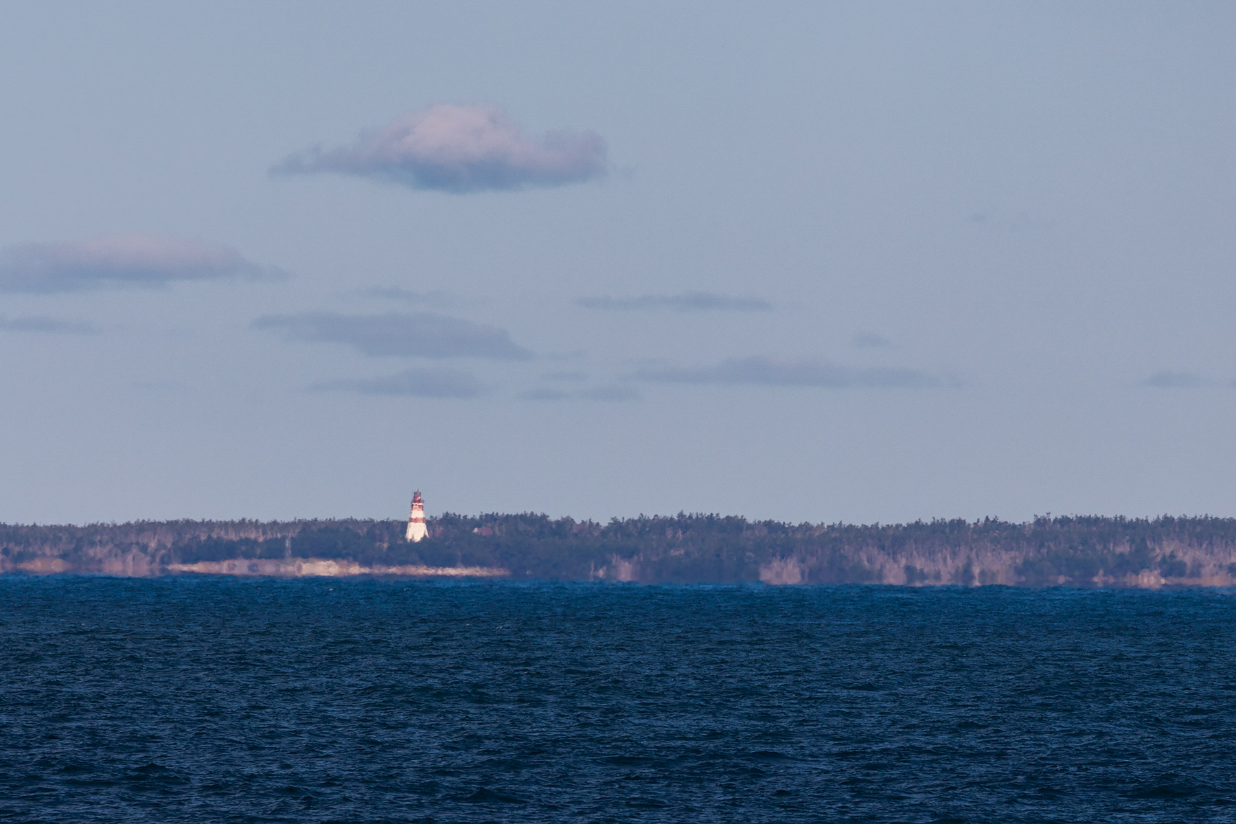 Distant shot of Seal Island lighthouse as we were cruising off the coast of Nova Scotia on our way to Halifax.  Click for next photo.