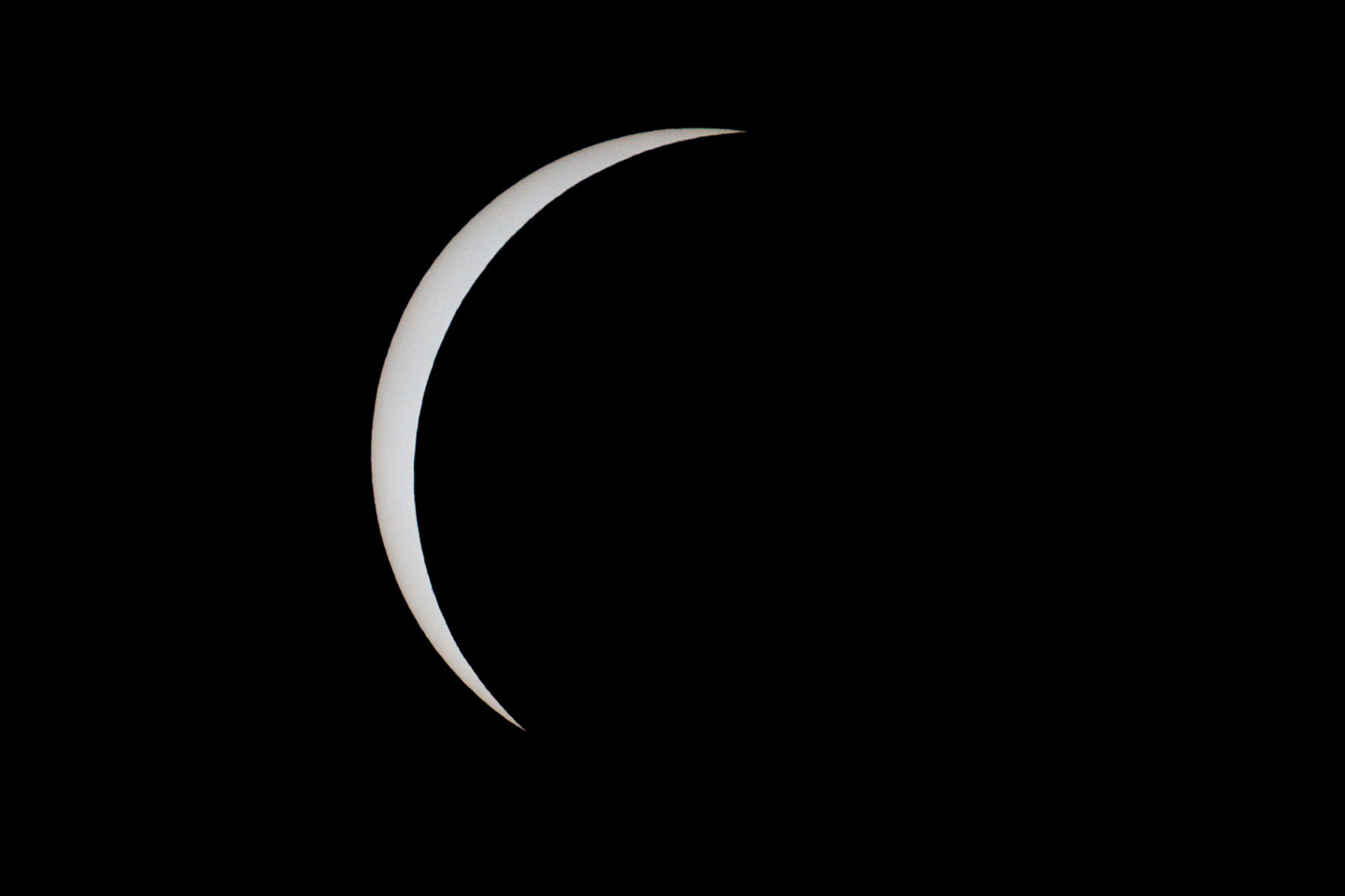 Partial phase of the eclipse, neutral glass filter.  Click for next photo.