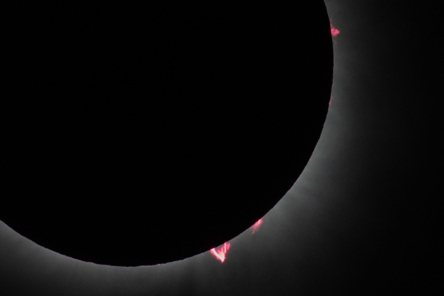 Getting toward the end of totality, lower right prominence becoming more prominent.  Click for next photo.