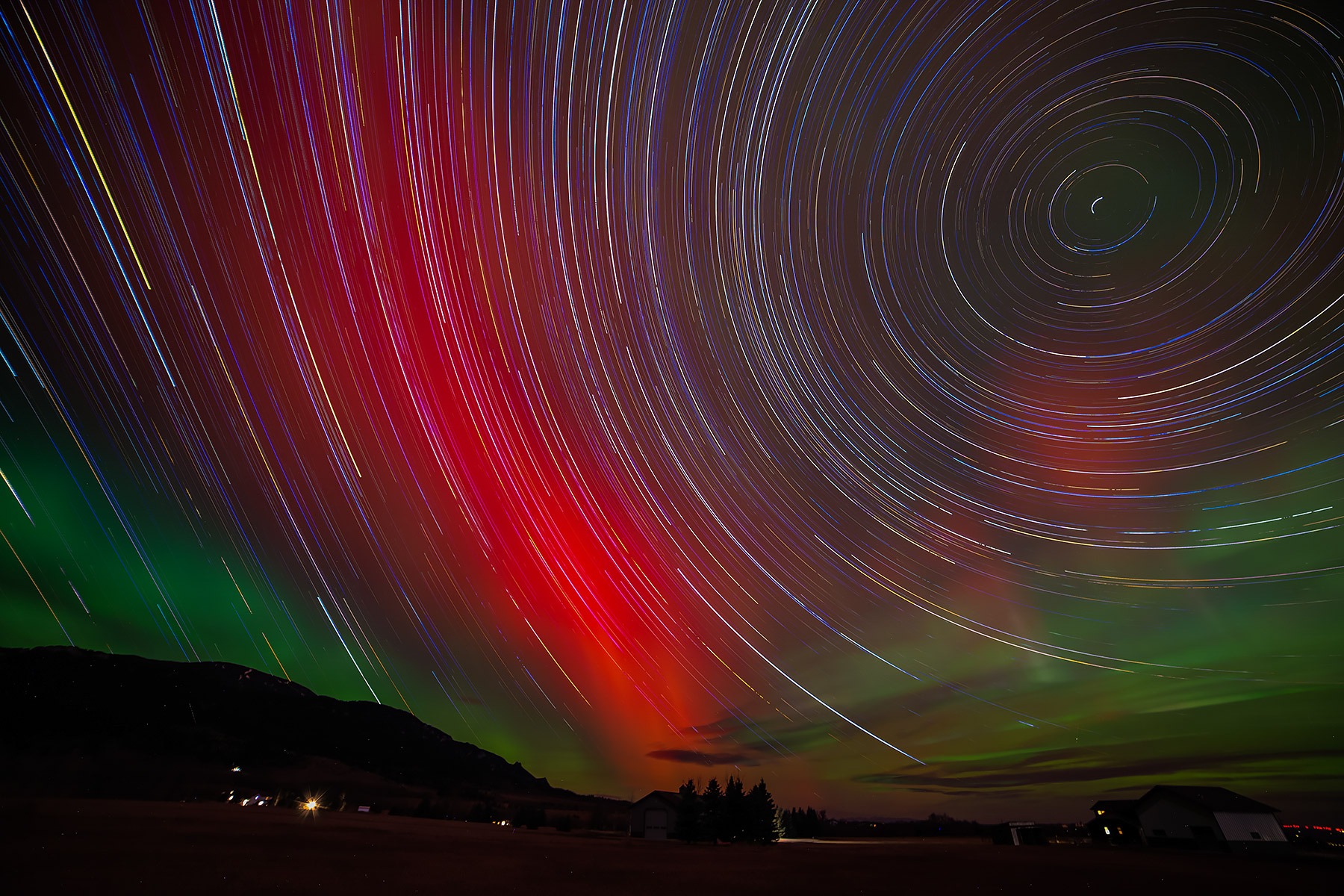 Northern Lights over Red Lodge Mountain, Montana.  Stack of 30-second images over 8 hours and 10 minutes.  Click for next photo.