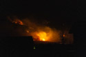 Glow from the East Side Fire can been seen from our house the evening after it started.